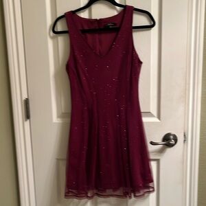 Beautiful holiday or event dresss in Burgundy , Size 2.